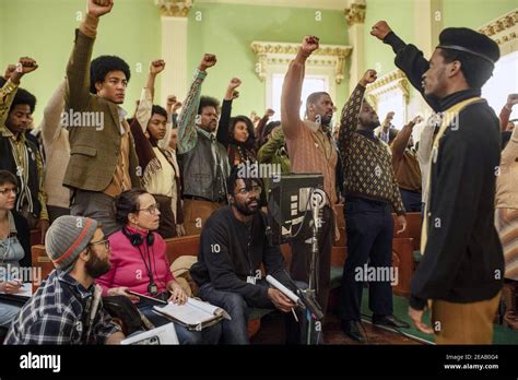 JUDAS AND THE BLACK MESSIAH, director Shaka King (center), on set, 2021 ...