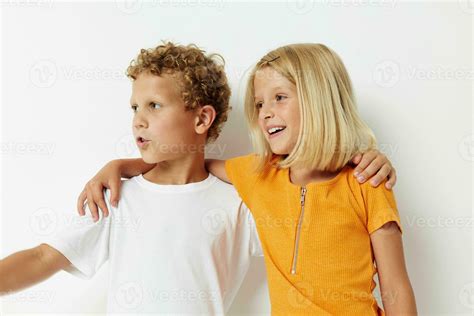 Cute preschool kids Friendship together posing emotions light background hold hands 25017663 ...