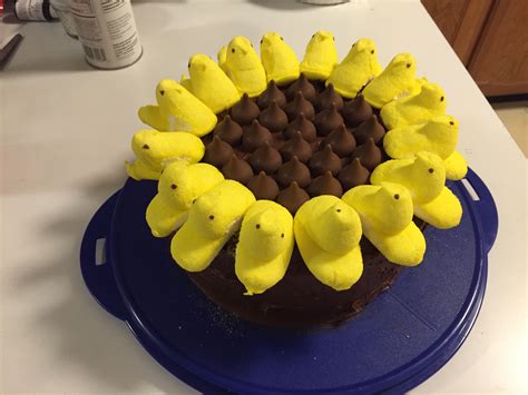 Peeps sunflower cake with Hershey vanilla cream kisses. Chocolate icing ...