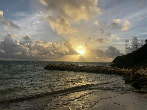 Beach sunrise in Antigua Photograph by Laura Zajac Neumann - Fine Art America