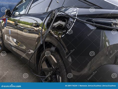 Black Peugeot Electric Car Recharging the Battery Editorial Stock Image ...