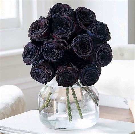 Black Flowers | Black wedding flowers, Black rose bouquet, Black rose