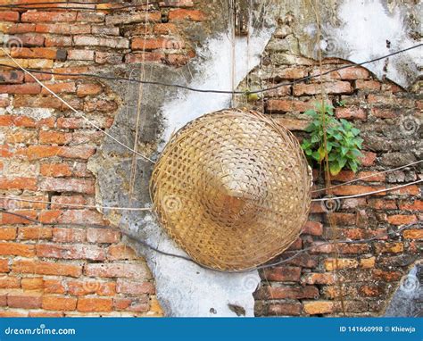 Traditional Hats Made of Bamboo Stock Photo - Image of brick, construction: 141660998