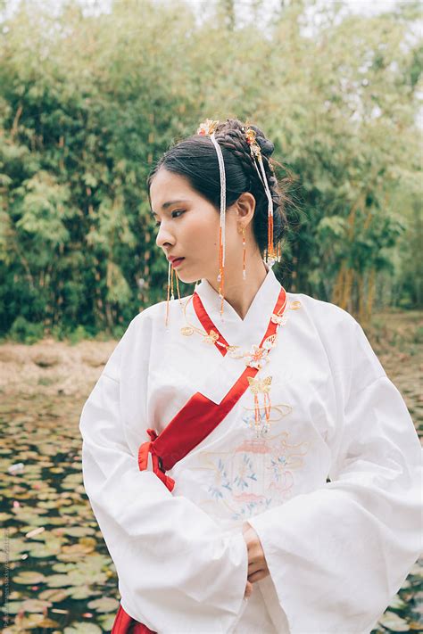 "Chinese Woman In Traditional Han Clothing" by Stocksy Contributor "Pansfun Images" - Stocksy