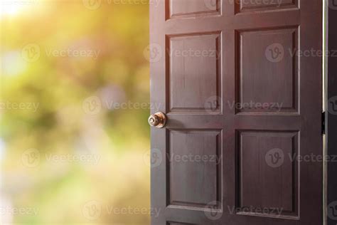 Open door with green nature bokeh background. 9497092 Stock Photo at Vecteezy