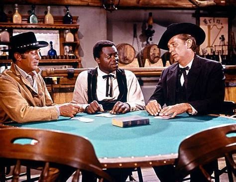 Dean Martin, Yaphet Kotto and Robert Mitchum in "Five Card Stud" 1968