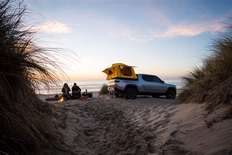 2020 Rivian R1T Tailgate Camping on beach area with sand | Rivian Forum