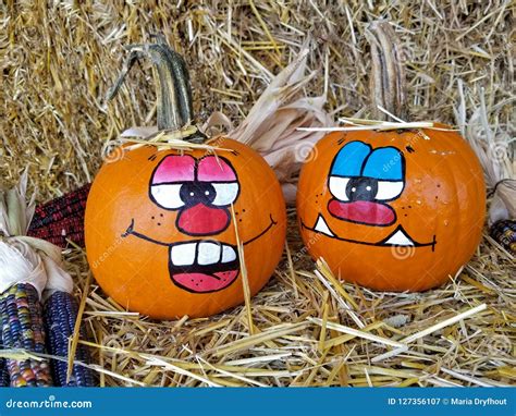 Funny Faces Painted on Orange Pumpkins Stock Image - Image of indian, bale: 127356107