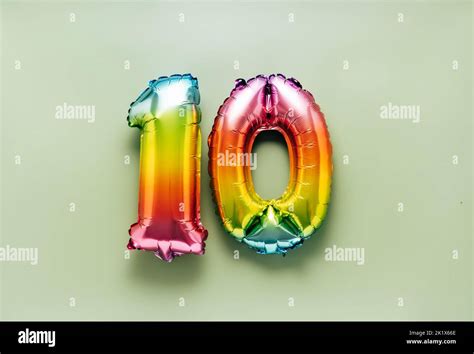 Colorful balloon number 10 on light green background. New Year of birthday concept Stock Photo ...