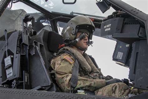 An Army pilot assigned to 25th Combat Aviation Brigade, 25th Infantry Division, prepares to fly ...