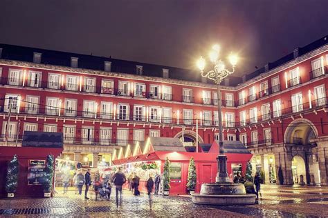 Christmas Market In Plaza Mayor Photograph by Facto Foto - Fine Art America