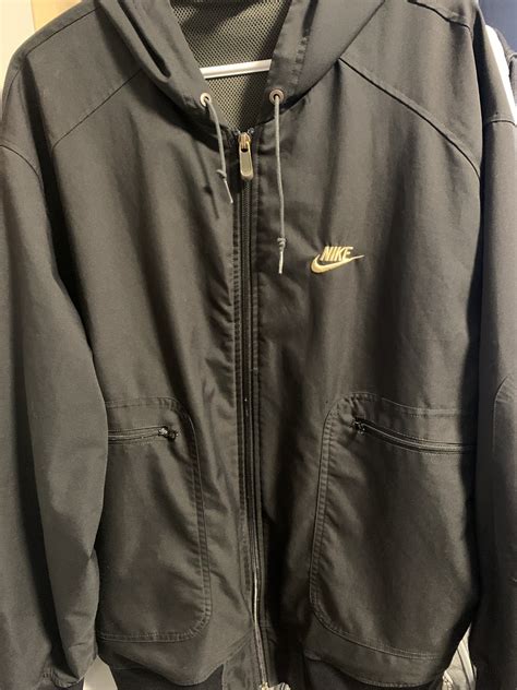 Nike Vintage Black and Gold Nike jacket | Grailed