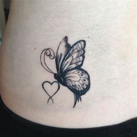 My new tattoo! The heart is an old tattoo gone over, the butterfly was the edition ...