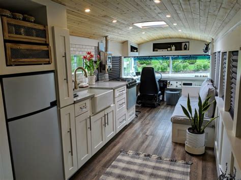 Couple converts "skoolie" bus into long-term road-worthy tiny home ...