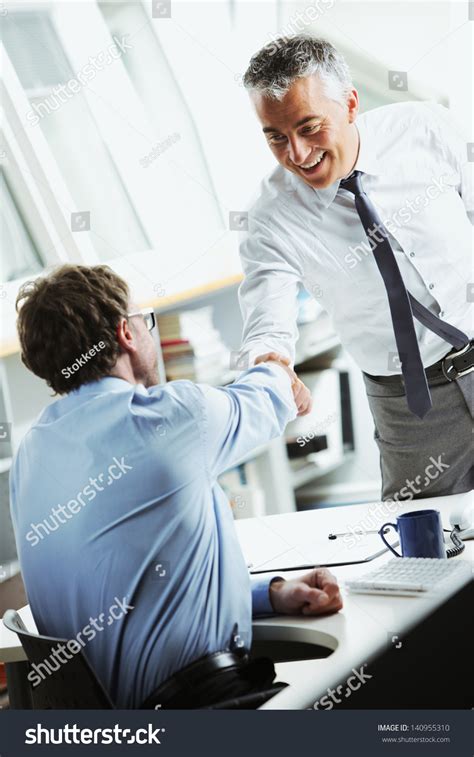 Businessmen Shaking Hands Office Stock Photo 140955310 | Shutterstock