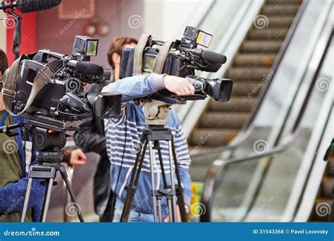 Cameramen with Their Equipment Stock Photo - Image of people, outdoors: 31543368