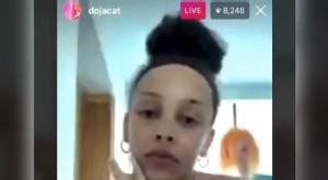 Doja Cat explains how her wigs have messed up her hairline, responding to fans who clown her ...