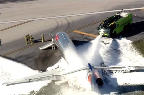 Plane catches fire after crash landing at Miami airport