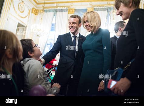 French President Emmanuel Macron and his wife Brigitte attend the ...