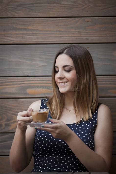 Beautiful Woman on the Wooden Table Stock Image - Image of coffee, holding: 97941559