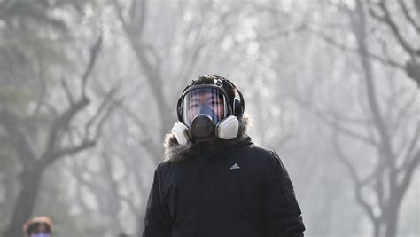 Photos: The smog that's choking Beijing as it faces the worst pollution of 2016 — Quartz