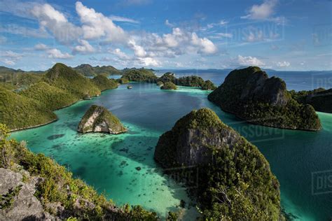 Aerial view of lagoon and karst limestone formations in Wayag Island, Raja Ampat, West Papua ...