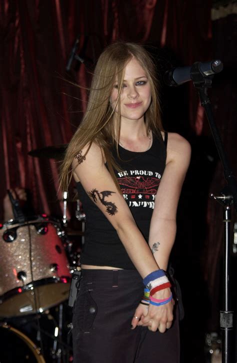 AVRIL LAVIGNE Performs at a Promotional Concert in New York 05/30/2020 ...