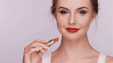 Beautiful Woman Applies Red Lipstick Showing Stock Footage SBV-335668432 - Storyblocks