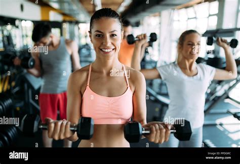 Group of people have workout in gym Stock Photo - Alamy