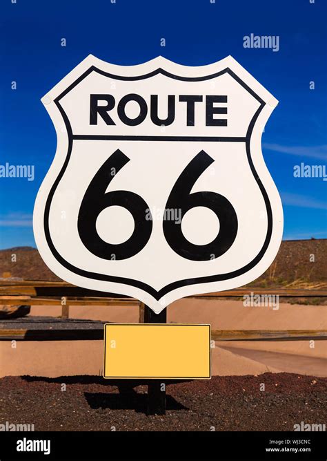 Route 66 road sign in Arizona under blue sky USA Stock Photo - Alamy