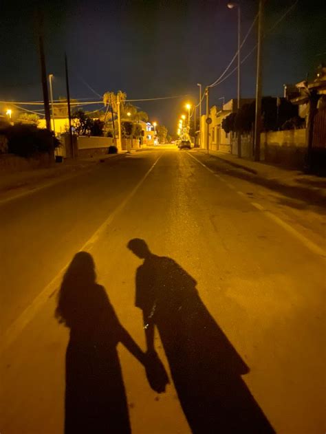 shadow pic, late night, italy, vibes, vacation, dark street, street lights, holding hands ...