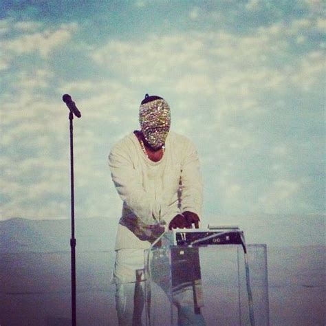 Kanye West wearing his Maison Martin Margiela diamond mask during his ...