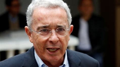 Colombia's Alvaro Uribe steps down to face charges - BBC News