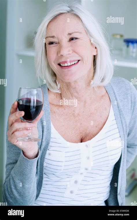 Elderly person drinking Stock Photo - Alamy