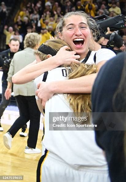 Iowa guard Kate Martin hugs Iowa guard Molly Davis after winning a... News Photo - Getty Images