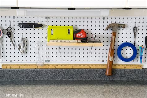 How to Install Pegboard above your Workbench - Girl, Just DIY!