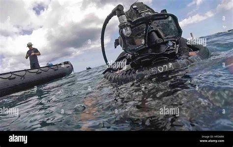 A U.S. Navy Explosive Ordnance Disposal (EOD) technician, assigned to Stock Photo, Royalty Free ...