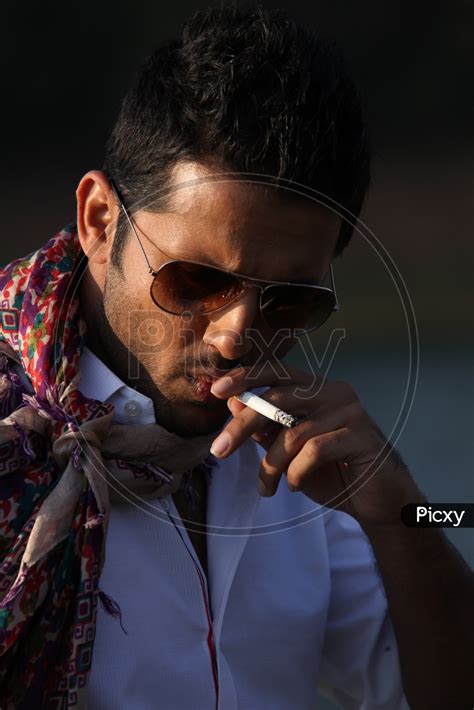 Image of Actor Nithin Smoking Cigarette In a Movie Shooting-ZT373483-Picxy