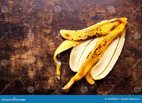 A Branch of Rotten Ripe Bananas Peel on Vintage Wooden Backgrou Stock Photo - Image of fruit ...