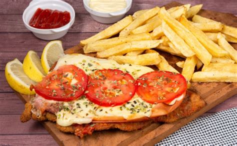 Receta tradicional argentina de milanesa napolitana casera