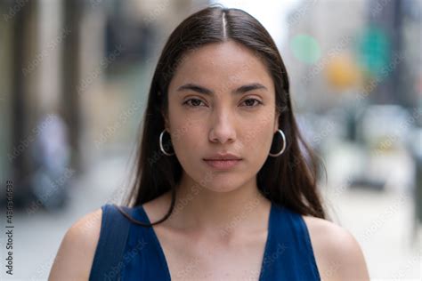 Young Latina Hispanic woman serious face portrait Stock Photo | Adobe Stock