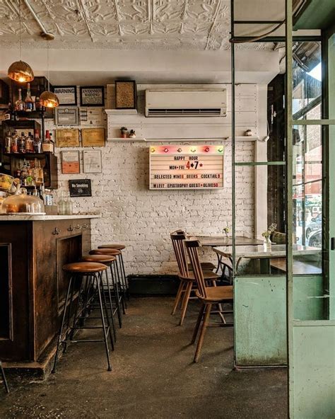 Rustic industrial cafe interiors with wooden accessories and metalwork ...