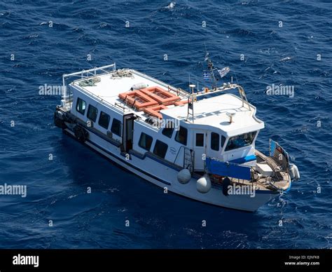 Mykonos, Greece small passenger ferry boat at sea Stock Photo - Alamy