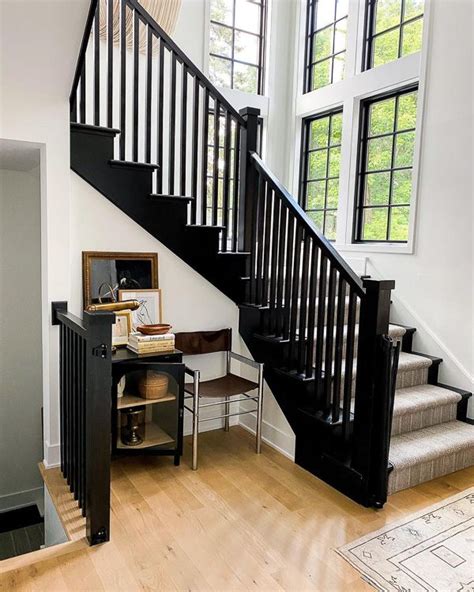 black painted interior stairs - Ester Coughlin