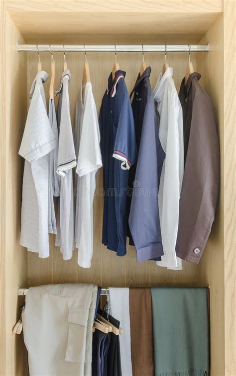 Wooden Closet with Clothes Hanging Stock Image - Image of style, hanger ...