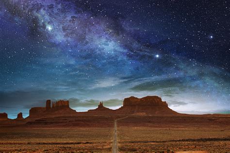 Monument Valley Under A Night Starry Sky Stock Photo - Download Image ...