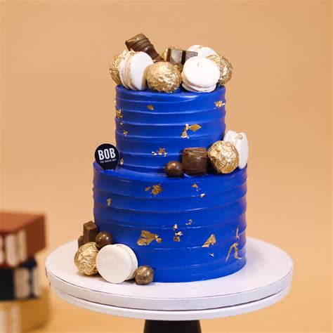 Royal Blue Cake With Chocolates And Macarons