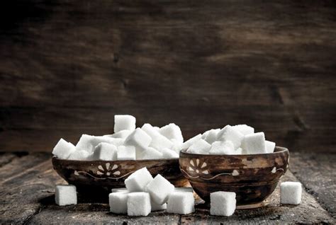 Premium Photo | Cubes of sugar in a bowl