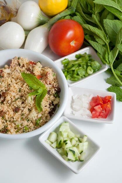 Premium Photo | Refreshing tabouleh salad surrounded by healthy ingredients