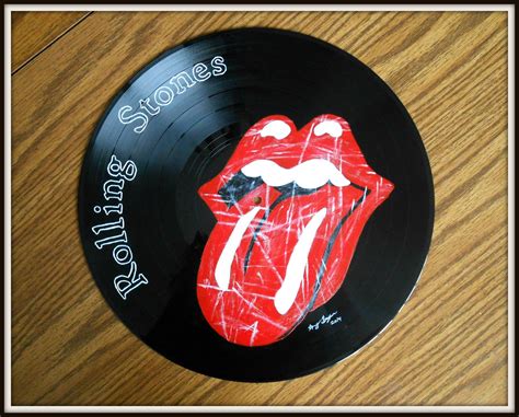 The Rolling Stones, painted on a vinyl record in acrylic paint. Record ...